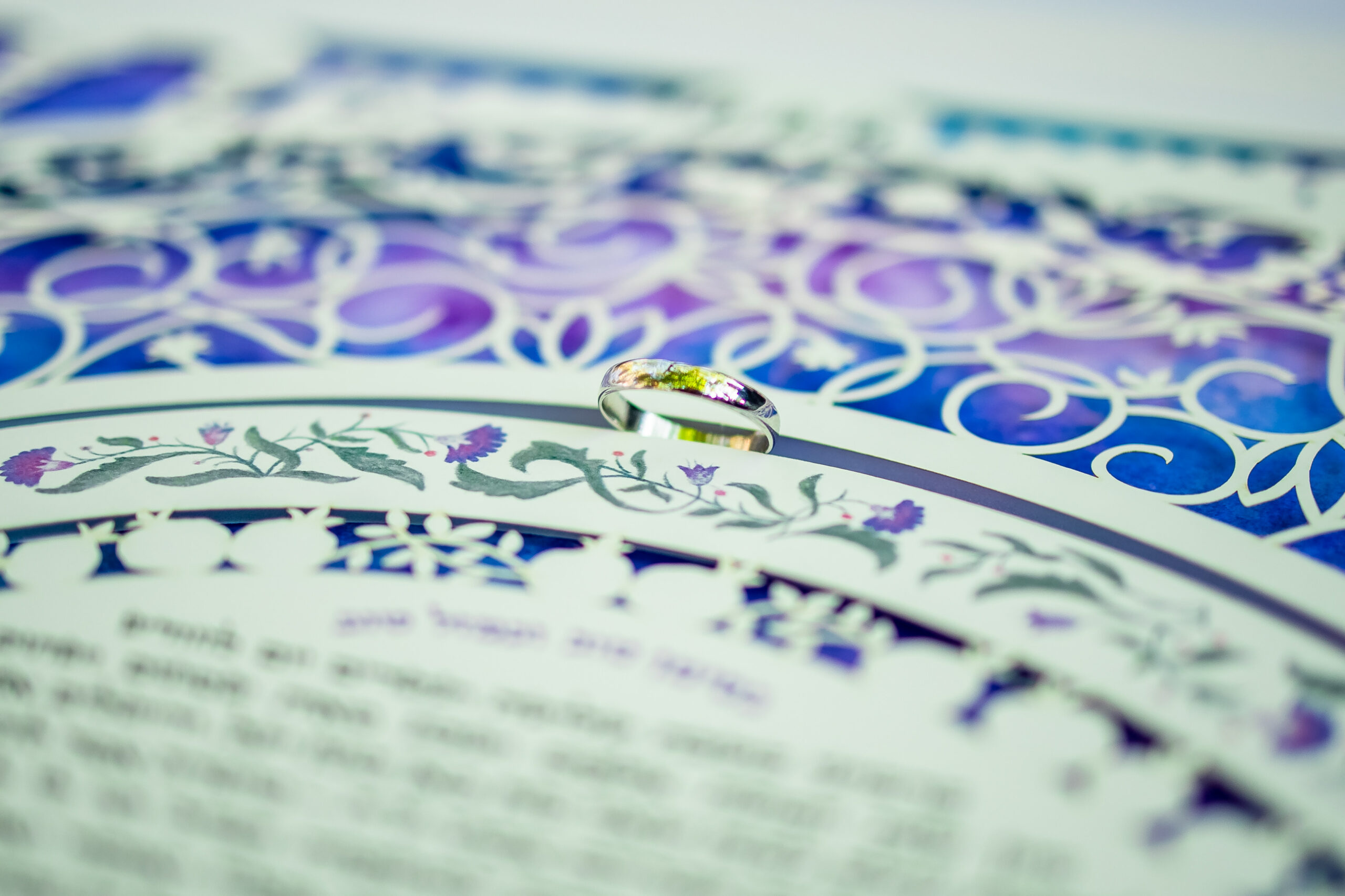 Close-up shot of a Ketubah with phrases of love and commitment